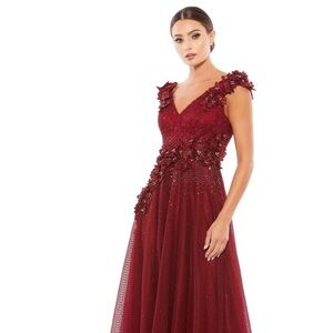 Burgundy floral appliqué Mac Duggar gown